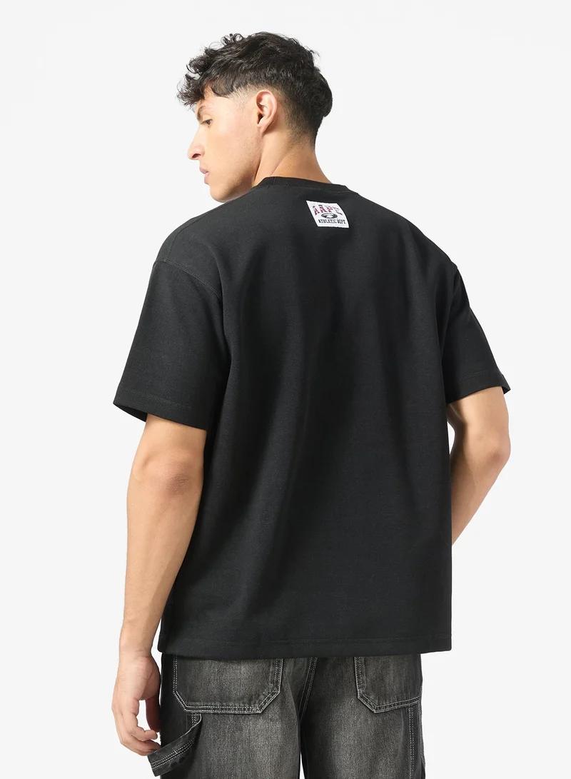 AAPE AAPEUNVS moonface college tee